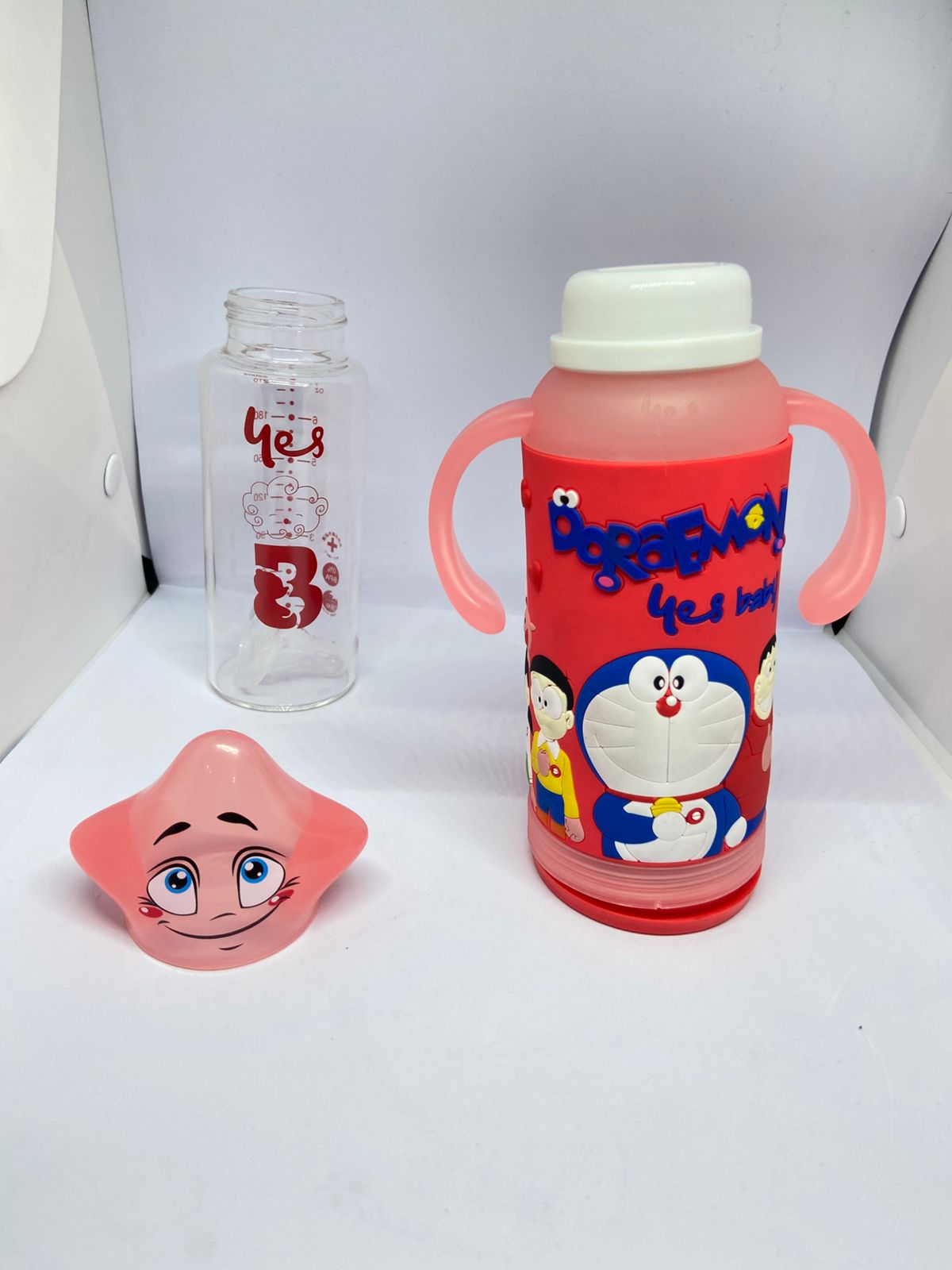 Baby Glass Feeder 180ml with Doraemon Silicone Cover