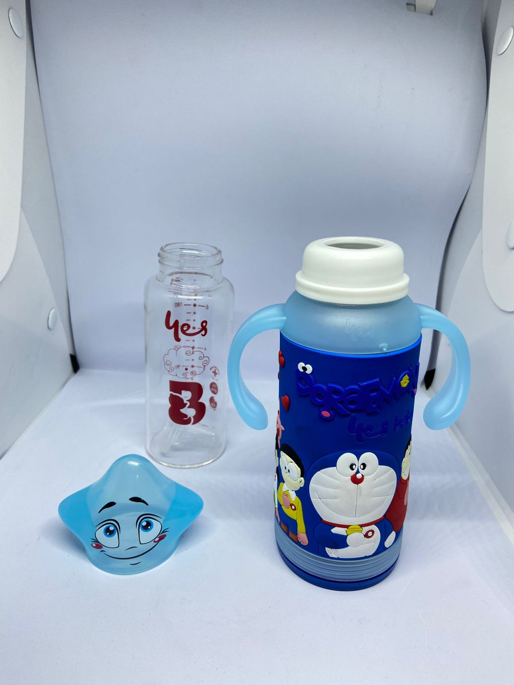 Baby Glass Feeder 180ml with Doraemon Silicone Cover