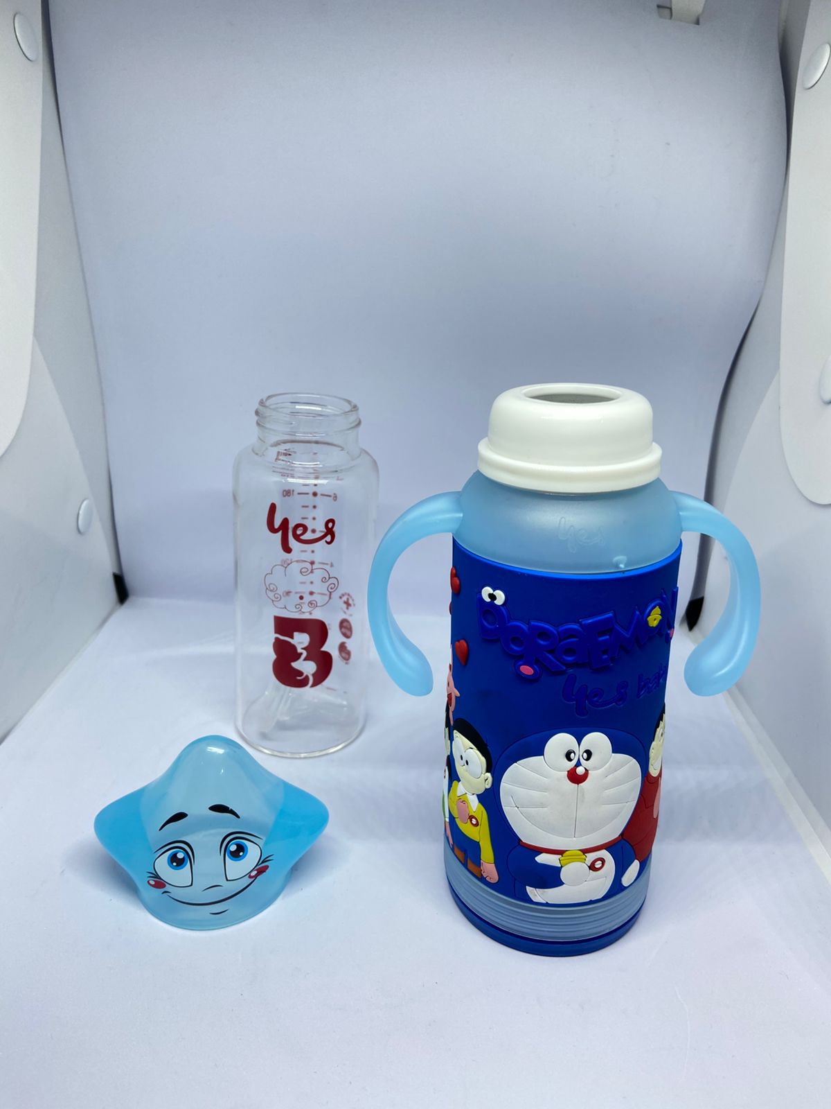 Baby Glass Feeder 180ml with Doraemon Silicone Cover