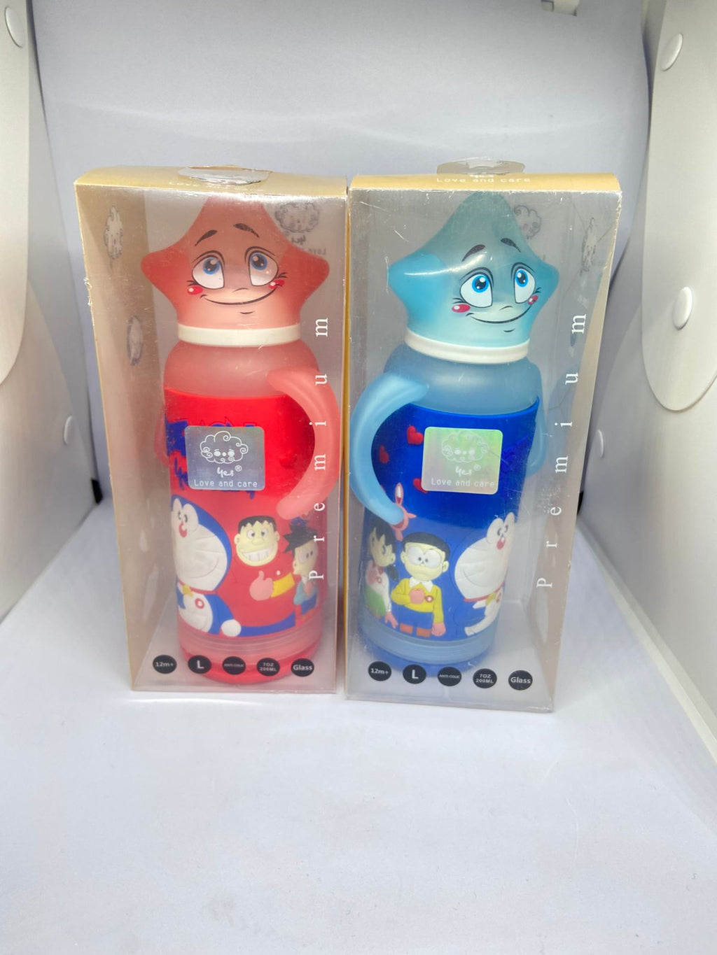 Baby Glass Feeder 180ml with Doraemon Silicone Cover