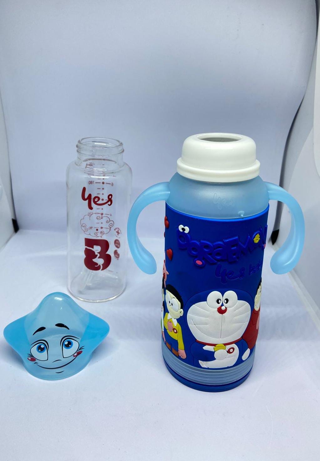 Baby Glass Feeding Bottle – Doraemon Silicone Cover, 120ml