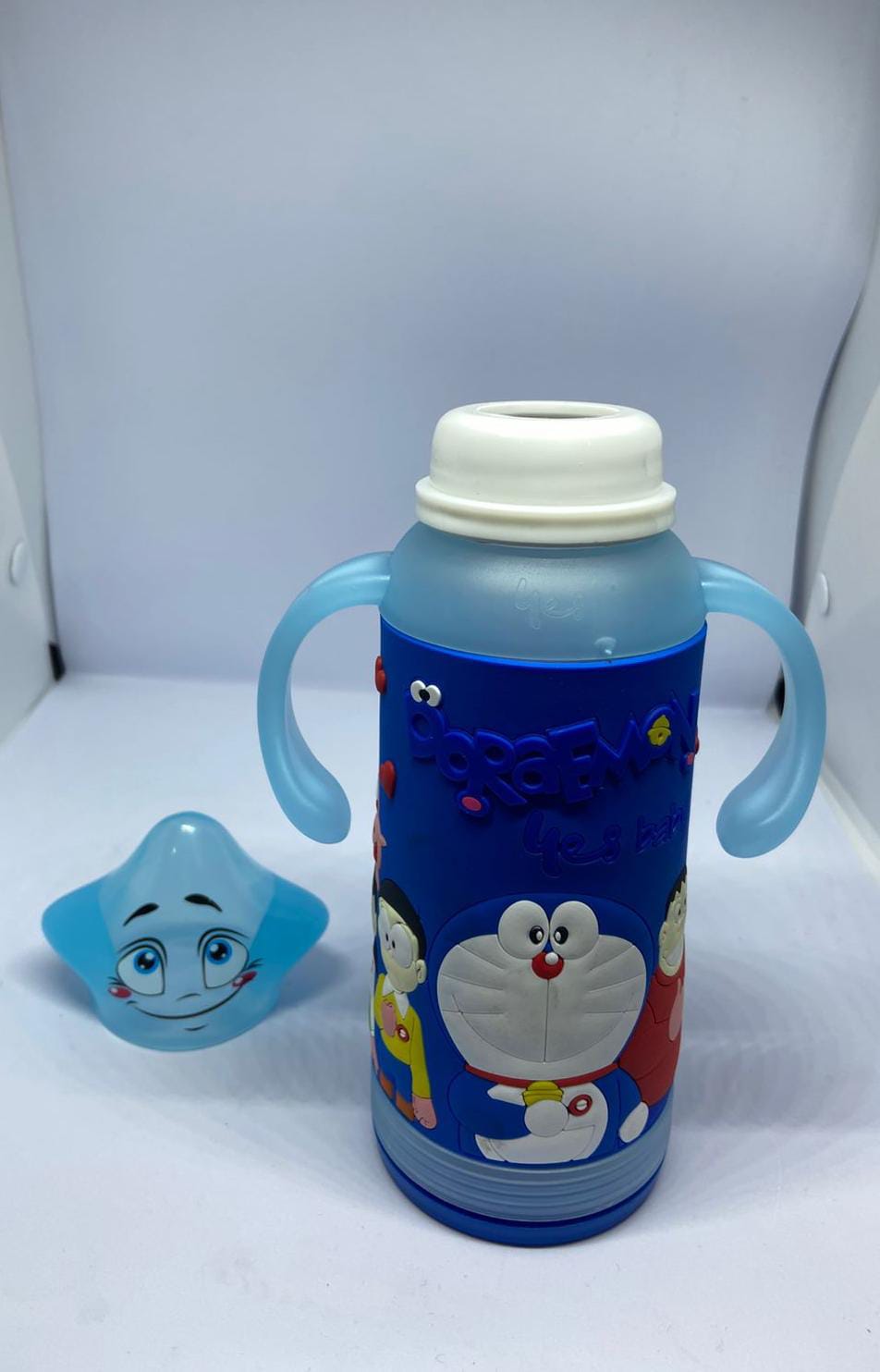 Baby Glass Feeding Bottle – Doraemon Silicone Cover, 120ml