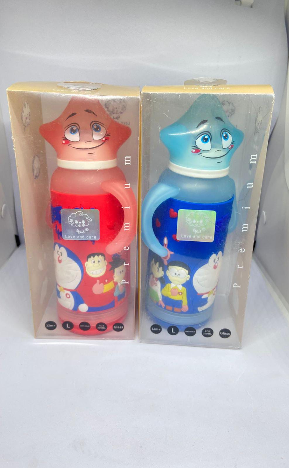 Baby Glass Feeding Bottle – Doraemon Silicone Cover, 120ml