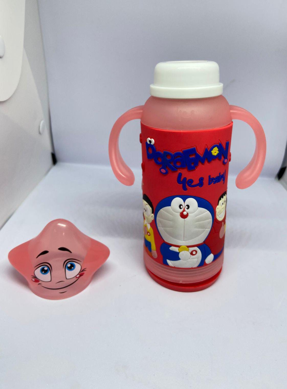 Baby Glass Feeding Bottle – Doraemon Silicone Cover, 120ml