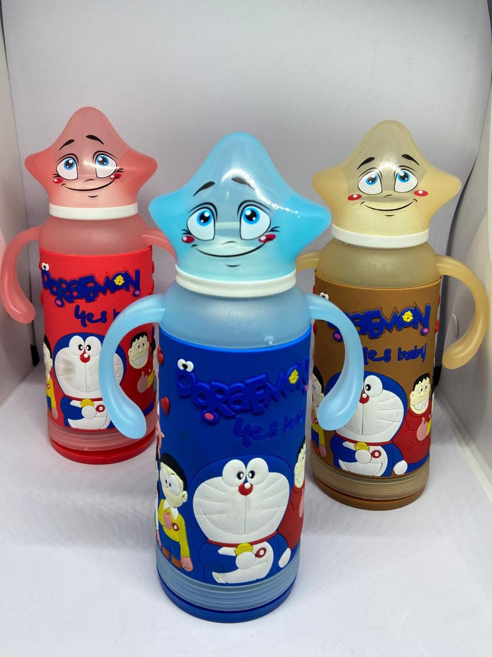 Baby Glass Feeding Bottle – Doraemon Silicone Cover, 120ml